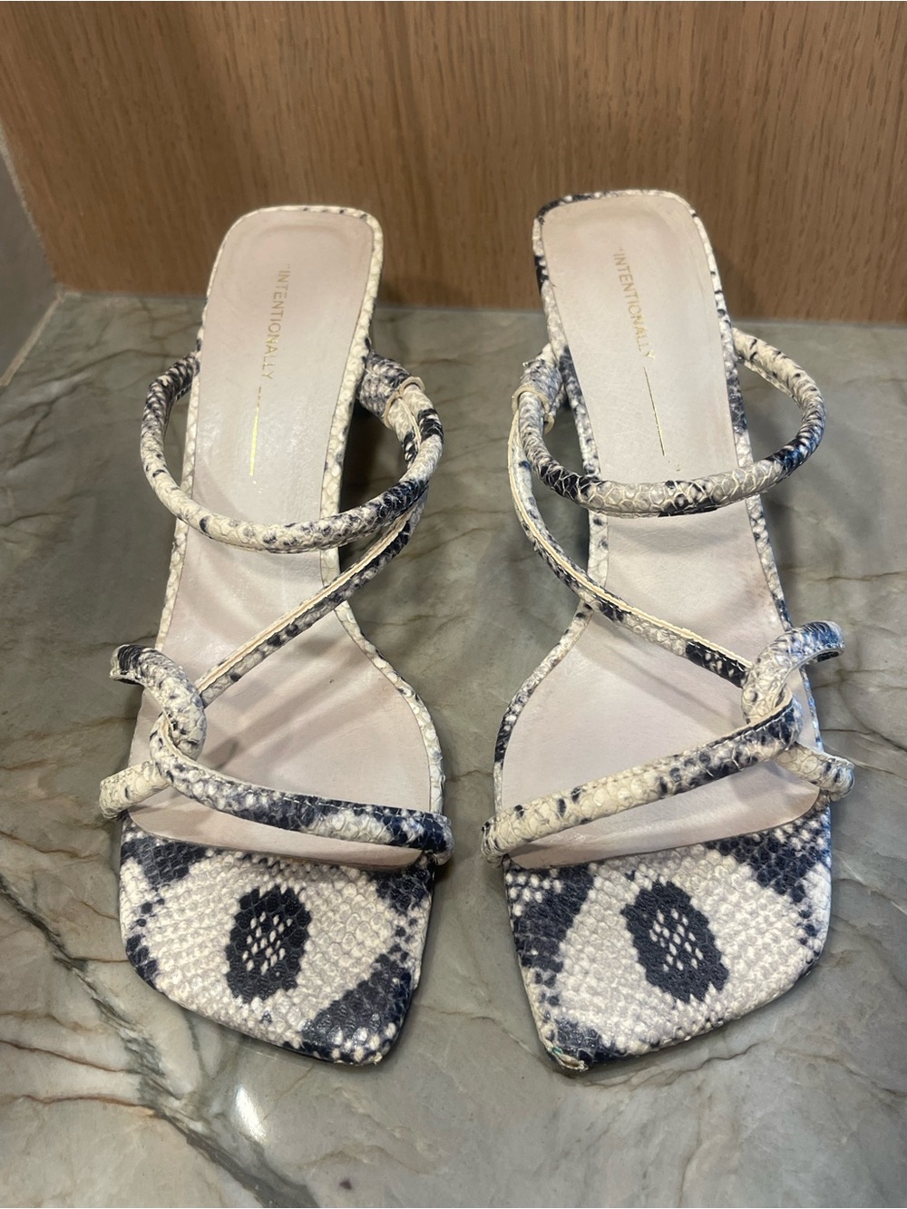INTENTIONALLY BLANK White and Black Snakeskin Strappy Heeled Slides